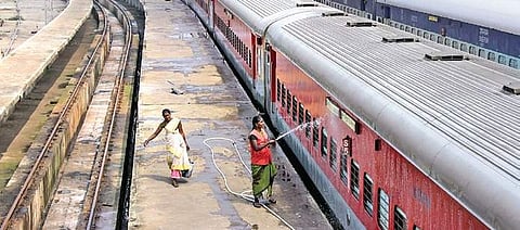 Women cleaning the train.