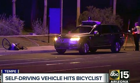 This March 19, 2018 still image taken from video provided by ABC-15, shows investigators at the scene of a fatal accident involving a self driving Uber car on the street in Tempe, Ariz. | AP