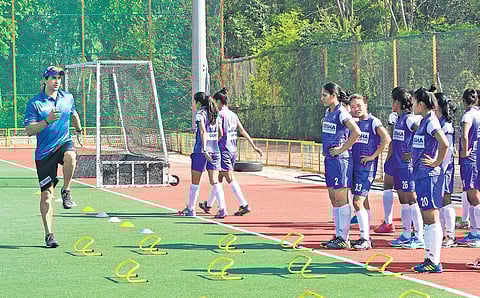 During Lombard’s tenure, the average score for the women’s team increased from 17 to 19.5.