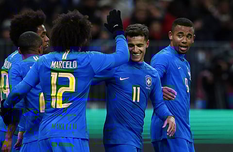 Brazil's Philippe Coutinho, 2nd right, celebrates after scoring his side's second goal during an international friendly soccer match against Russia. | AP