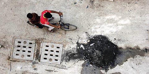 A heap of sewage dump left after cleaning of drains at Nawab Saheb Kunta at Old City of Hyderabad on Saturday | Sathya keerthi