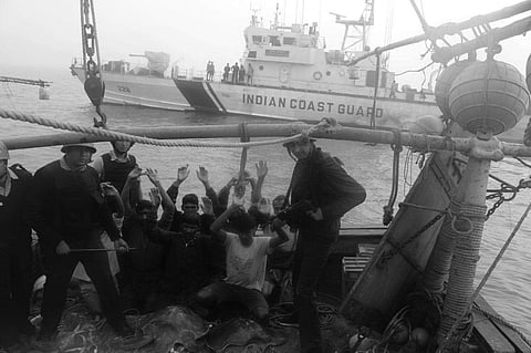 Coast Guard personnel arresting fishermen for fishing illegally at Gahirmatha | Express