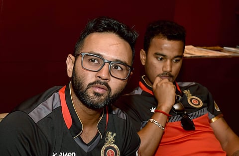 Royal Challengers Bangalore players Parthiv Patel and Pawan Negi look on during a press conference ahead of their inaugural match against Kolkata Knight Riders for IPL 2018. | PTI