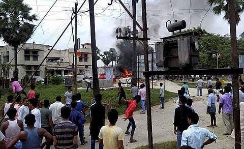 Representational image. In this 2017 file photo, smoke rises from burning police vehicles in Tajjpur police station campus after it was torched by an angry protesters at Tajpur in Samastipur district. (Photo | PTI)