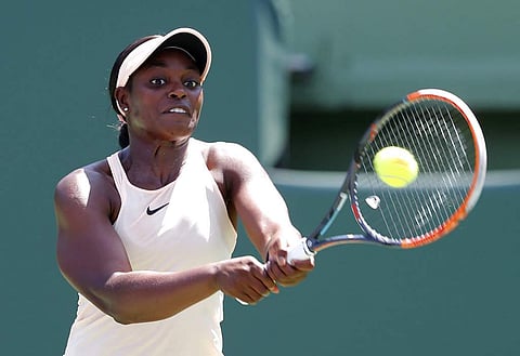 Sloane Stephens returns the ball to Victoria Azarenka, of Belarus, during their semifinal match in the Miami Open tennis tournament. (AP)