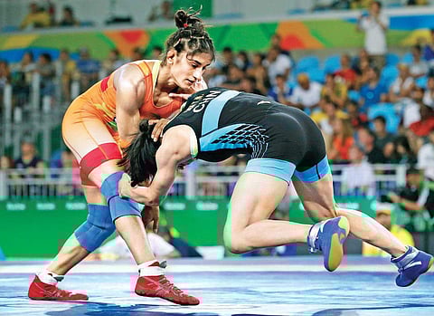 Vinesh Phogat (left) revealed that she has worked on her reaction speed and expects to peak by Tokyo 2020