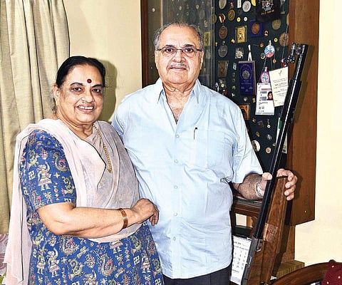 Roopa Unnikrishnan’s parents show her rifle and medals at her residence in Chennai | martin louis