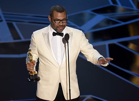'Get Out' has won the Academy Award for best original screenplay, giving writer-director Jordan Peele a historic win. Peele is the first African-American writer to win in the category. (Photo | AP)