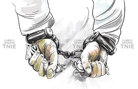 The four persons were booked under Sections 143, 290, 295A and 149 of the Indian Penal Code.