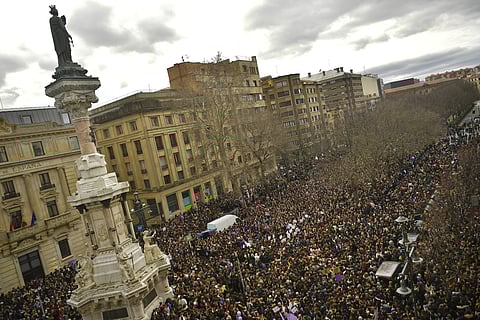 Thousands of demonstrators protest male violence against women and demanding an equality labour opportunities at the Paseo Sarasate Promenade, during the female general strike to commemorate International Women's Day, in Pamplona, northern Spain. | AP