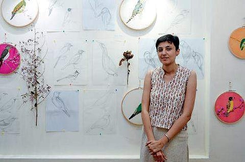 Medha Bhatt with her art work Manu R Mavelil