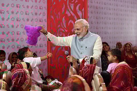 Prime Minister Narendra Modi interacts with the 'Beti Bachao Beti Padhao' beneficiaries on the occassion of International Women's Day in Jhunjhunu Rajasthan. | PTI