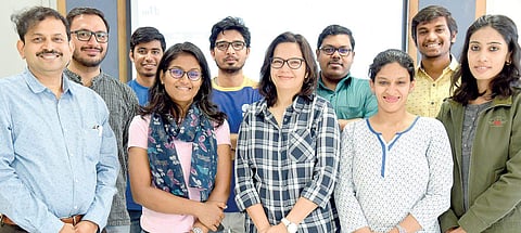 Prof Debabrata Das (extreme left) and ProfJyotsna Bapat (fifth from right) with the team Nagaraja Gadekal