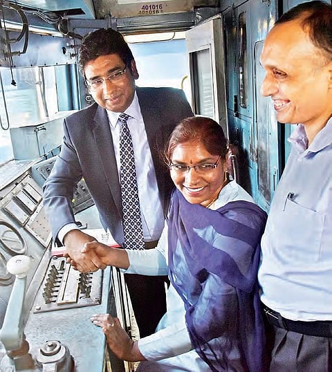 General Manager of South Central Railway Vinod Kumar Yadav interacts with a woman loco pilot (MMTS driver) at Begumpet railway station on Thursday | Vinay madapu