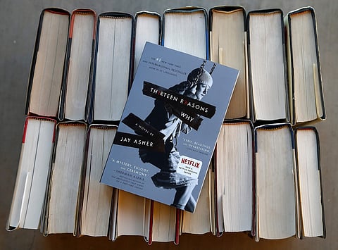 File photo of the book 'Thirteen Reasons Why'. Jay Asher's 'Thirteen Reasons Why' and Sherman Alexie's 'The Absolutely True Diary of a Part-Time Indian' top the list of 'challenged' books from 2017 | AP