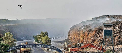 Smoke arising from Kodungayur dump yard near the city on Monday | P Jawahar