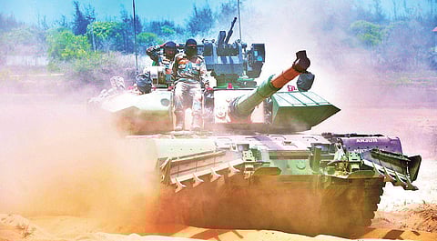 Heavy equipment, including battle tanks and military helicopters,