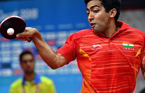 India's Harmeet Desai hits a return against Nigeria's Quadri Aruna during their men's singles quarter-final table tennis match during the 2018 Gold Coast Commonwealth Games. (Photo: AFP)