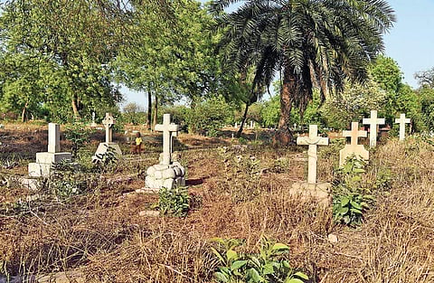 Thick, tangled vegetation has swallowed headstones and grave-markers in the National Capital's oldest British cemetery | parveen negi