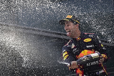 Red Bull driver Daniel Ricciardo of Australia won the Chinese Formula One Grand Prix at the Shanghai International Circuit on April 15, 2018. (AP Photo)