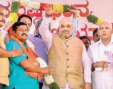 Amit Shah with B S Yeddyurappa at a public meeting in Karnataka | PTI