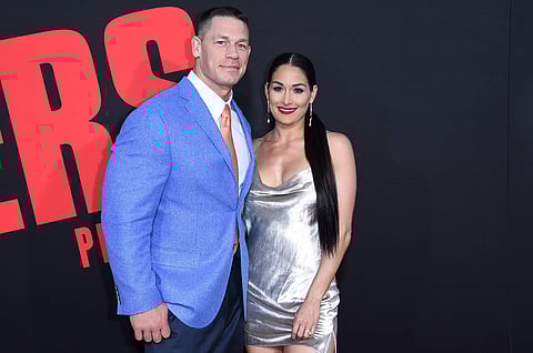 In this Tuesday, April 3, 2018, photo, John Cena, left, and Nikki Bella attend the LA Premiere of 'Blockers' at the Regency Village Theatre in Los Angeles. | AP