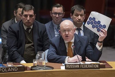 Russian Ambassador to the United Nations Vassily Nebenzia holds up a British report on Salisbury Incident as he speaks during a Security Council meeting on the situation between Britain and Russia (File Photo | AP)