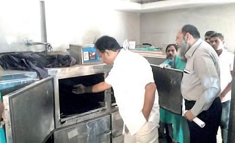 Health minister C Laxma Reddy inspecting a freezer were bodies are kept at Osmania General Hospital in Hyderabad | EXPRESS PHOTOCurrently,