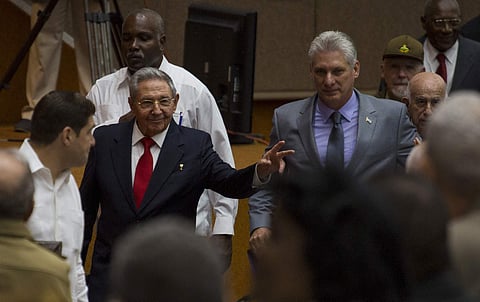 Raul Castro (center left) enters the National Assembly followed by his successor Miguel Diaz-Canel (center right). (Photo | AP)