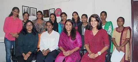 The benefictiaries of the Dress Bank project with the trainers