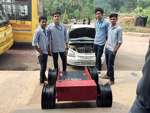 C Vaishnav, P Amalraj, Amal Premarajan and Arjun Ravi pose with their invention