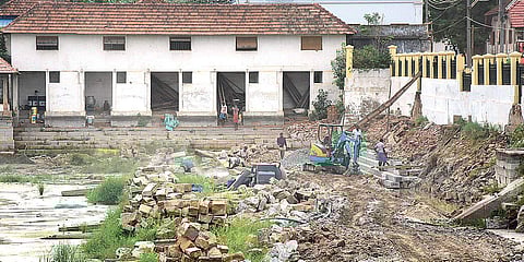 Renovation work in progress at the Padmatheertham pond of Sree Padmanabhaswami temple in Thiruvananthapuram on Friday. Pond renovation and beautification of the temple premises are being done under the Swadesh Darshan scheme of the Central Government | B