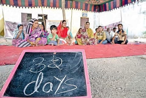 Protest by the members of a women cooperative society enters its 32nd day on Friday, at Nanakramguda in Hyderabad | R Satish Babu