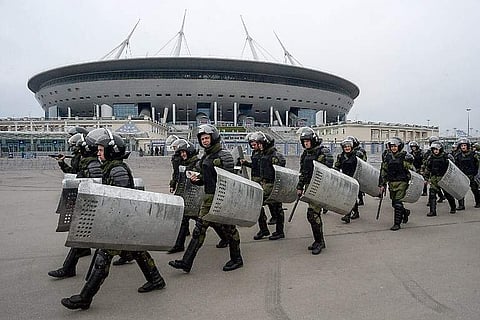 Russian riot policemen take part in special security exercises at the Saint-Petersburg Stadium (Krestovsky Stadium) in Saint Petersburg on April 20, 2018, ahead of the 2018 FIFA World Cup tournament in Russia. | AFP