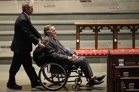 Former Presidents George W. Bush, left, and George H.W. Bush arrive at St. Martin's Episcopal Church for a funeral service for former first lady Barbara Bush, Saturday, April 21, 2018, in Houston. (AP Photo/David J. Phillip )