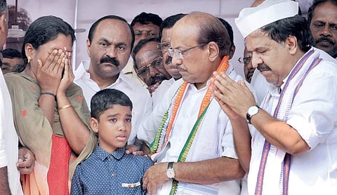 Sneha, wife of Mukundan who died allegedly due to manhandling by the police officers involved in the Sreejith custodial death case. | A Sanesh