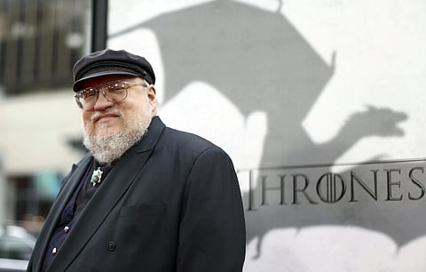 George R.R. Martin arrives at the premiere for the third season of the HBO television series 'Game of Thrones' at the TCL Chinese Theatre in Los Angeles. (Photo: AP)