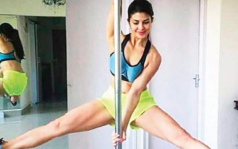 Jacqueline Fernandez have made pole workout a part of their fitness regime