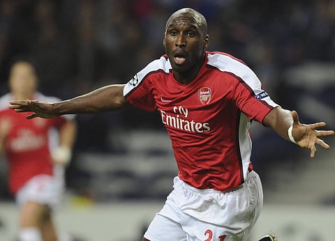 In this Wednesday, Feb. 17, 2010 file photo, Arsenal's Sol Campbell celebrates after scoring against FC Porto in a Champions League round of 16 first leg soccer match at Porto's Dragon Stadium in Porto, Portugal. | AP