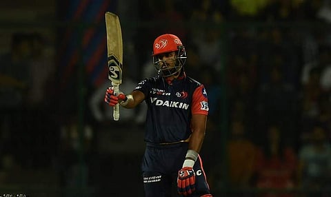 Delhi Daredevils captain Shreyas Iyer raises his bat after hitting a half cantury (50 runs) plays a shot during the 2018 Indian Premier League (IPL) Twenty20 cricket match between Delhi Daredevils and Kolkata Knight Riders. | AFP