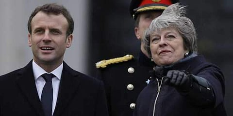 Emmanuel Macron and Theresa May (Photo | AP )