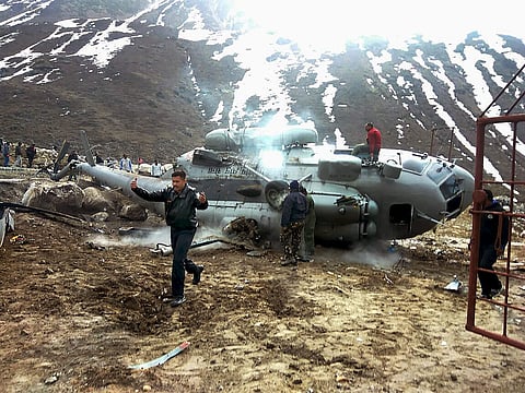 Wreckage of an MI-17 helicopter of the Indian Air Force IAF that crashed 20 meters before landing at the Kedarnath helipad on Tuesday morning. (PTI)