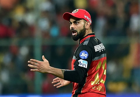 Virat Kohli reacts after a boundary during the IPL 2018 match at Chinnaswamy Stadium in Bengaluru. | PTI