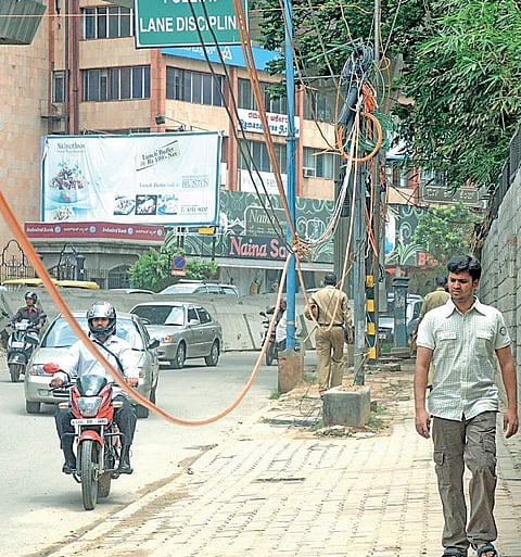 Electric wires hanging dangerously pose risk to lives of both humans and animals
