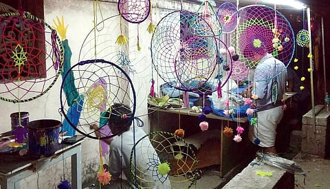 Students protesting inside the temporary pandal erected in front of RLV College