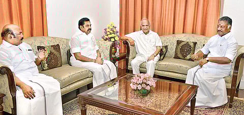 CM Edappadi K Palaniswami, Dy CM O Panneerselvam and Fisheries Minister D Jayakumar briefing Governor Banwarilal Purohit about Cauvery water issue and related protests in TN at the Raj Bhavan on Wednesday. | EPS