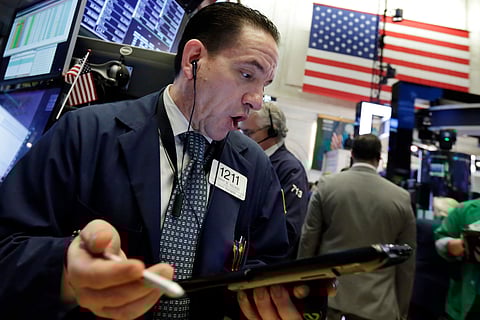 Stocks are opening sharply lower on Wall Street as an escalating trade dispute between the U.S. and China poses a threat to global economic growth and corporate profits. (Photo | AP)
