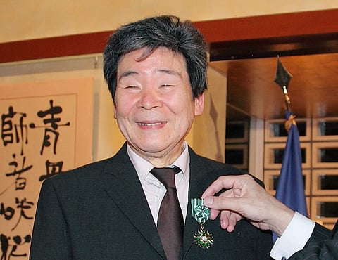 In this April, 2015, photo, Isao Takahata, co-founder of the prestigious Japanese animator Studio Ghibli, receives Officer of the French Order of Arts and Letters in Tokyo. | AP