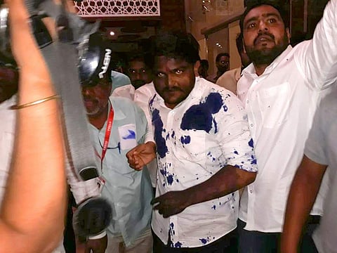 Patidar leader Hardik Patel after the ink attack in Ujjain town of Madhya Pradesh on Saturday evening. (EPS)