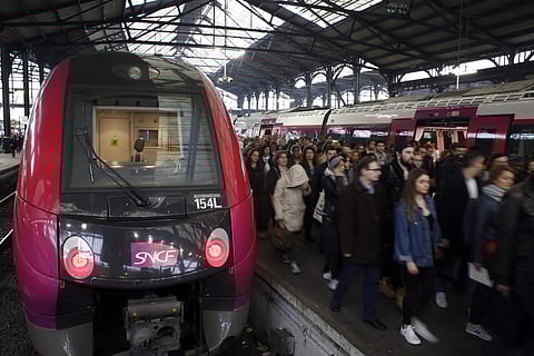Commuters arrive at Saint-Lazare train station during strike action, in Paris, France, Monday, April 9, 2018. (Photo: AP)